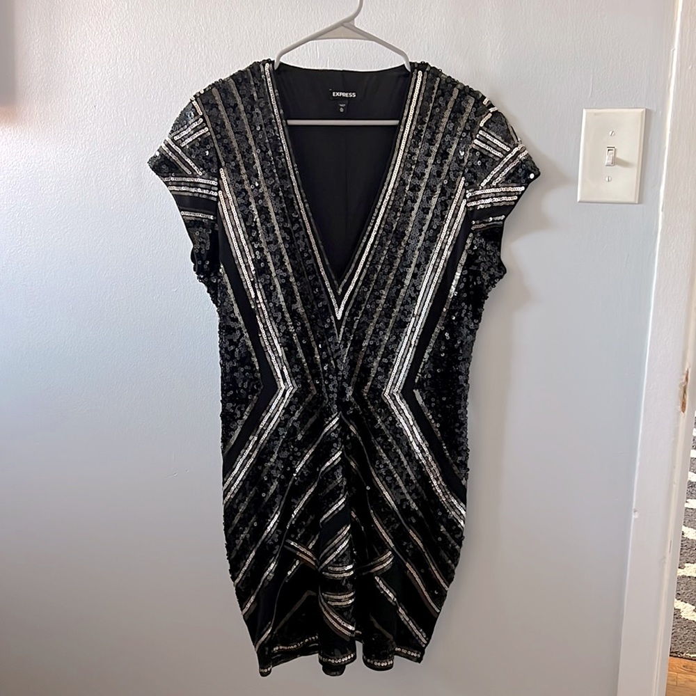 Express black sequins dressed XL . Worn for photoshoot . No tag.